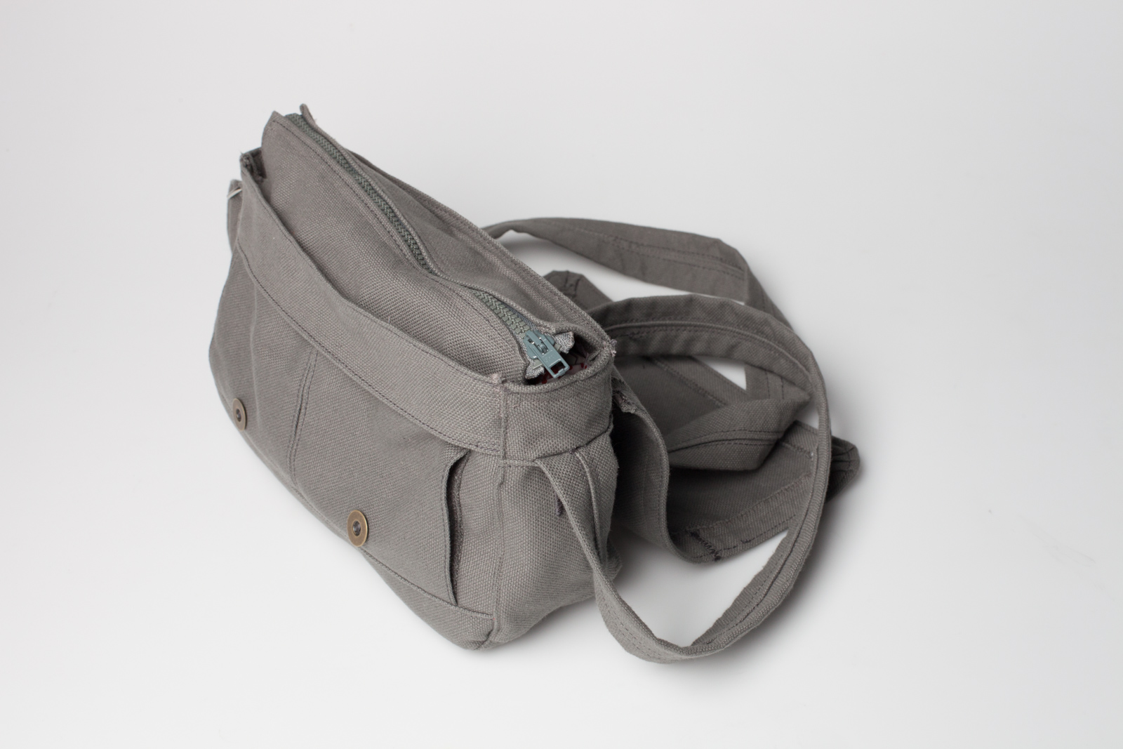 the closed grey fabric handbag